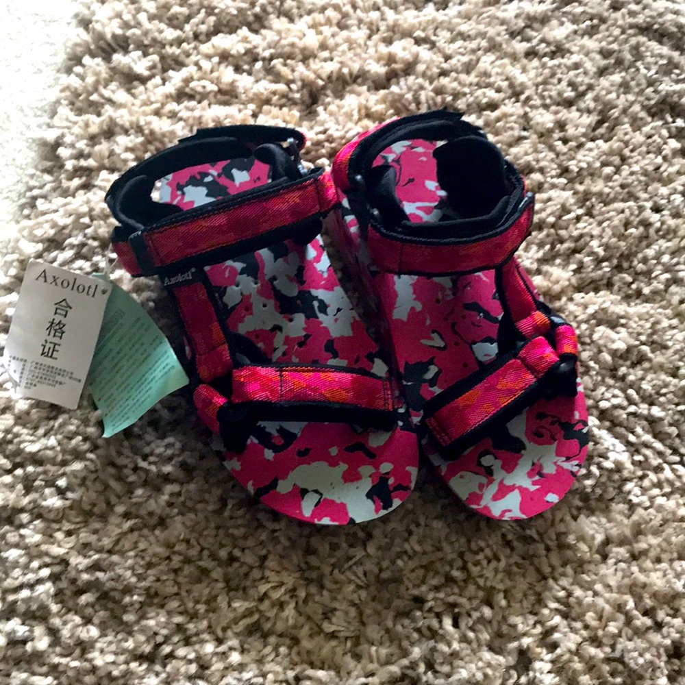 Brand new Sandals with adjustable belts